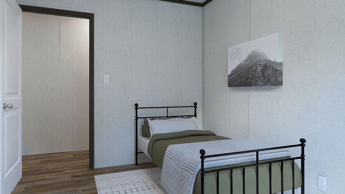 The ESSENCE Guest Bedroom. This Manufactured Mobile Home features 3 bedrooms and 2 baths.