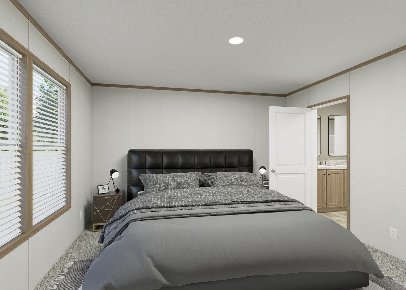 The THE RESERVE 52 Primary Bedroom. This Manufactured Mobile Home features 3 bedrooms and 2 baths.