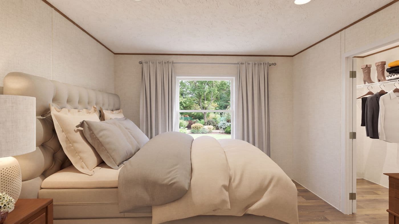 The CYPRESS Primary Bedroom. This Manufactured Mobile Home features 4 bedrooms and 2 baths.