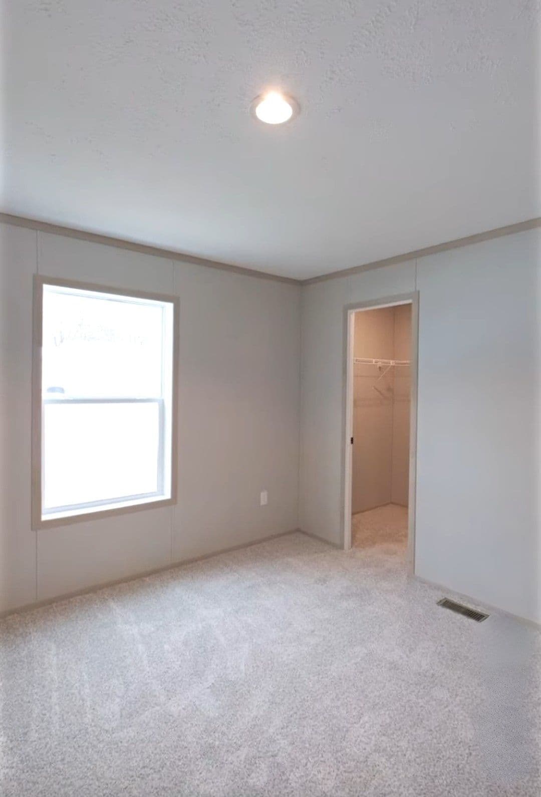 The TURQUOISE Guest Bedroom. This Manufactured Mobile Home features 2 bedrooms and 2 baths.