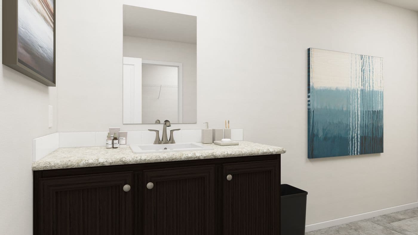 The SLE 561F Primary Bathroom. This Manufactured Mobile Home features 3 bedrooms and 2 baths.