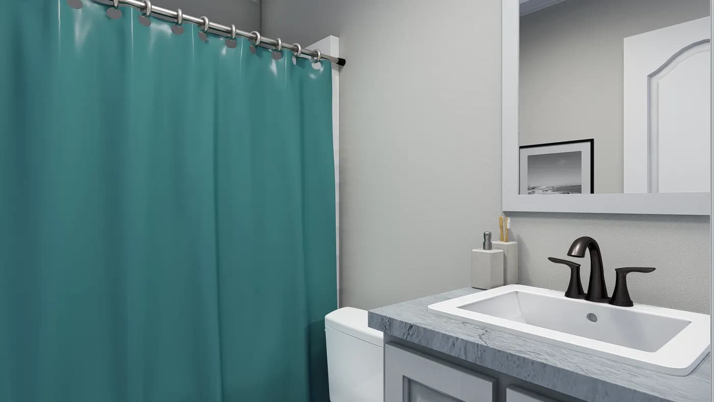 The THE WAVERLY Guest Bathroom. This Manufactured Mobile Home features 3 bedrooms and 2 baths.