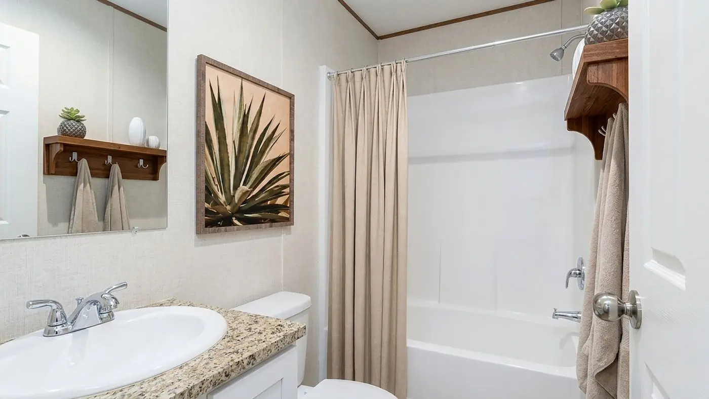 The MAPLE Guest Bathroom. This Manufactured Mobile Home features 3 bedrooms and 2 baths.