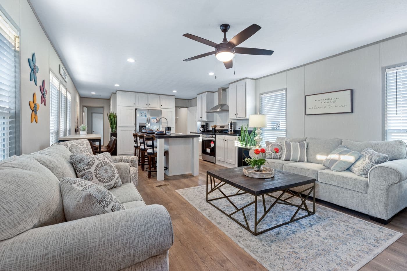 The RESOLUTION 16763X Living Room. This Manufactured Mobile Home features 3 bedrooms and 2 baths.