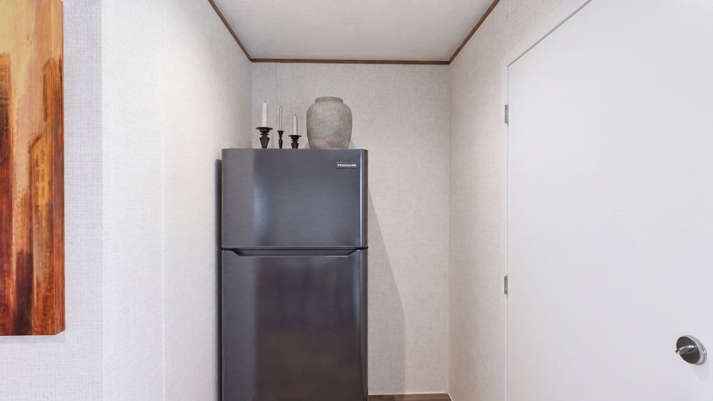 The TULIP Utility Room. This Manufactured Mobile Home features 2 bedrooms and 1 bath.