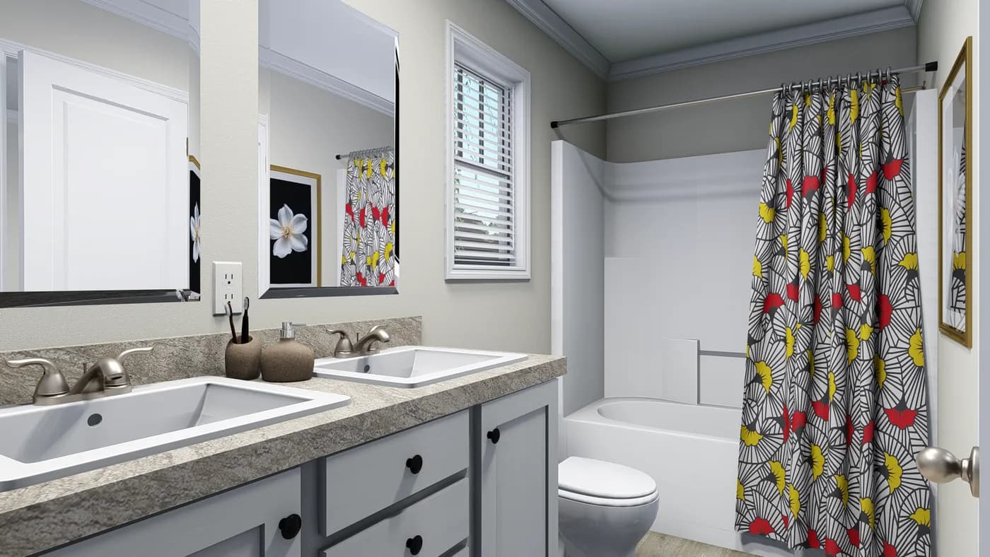 The 7010 "YADKIN" 7616 Guest Bathroom. This Manufactured Mobile Home features 3 bedrooms and 2 baths.