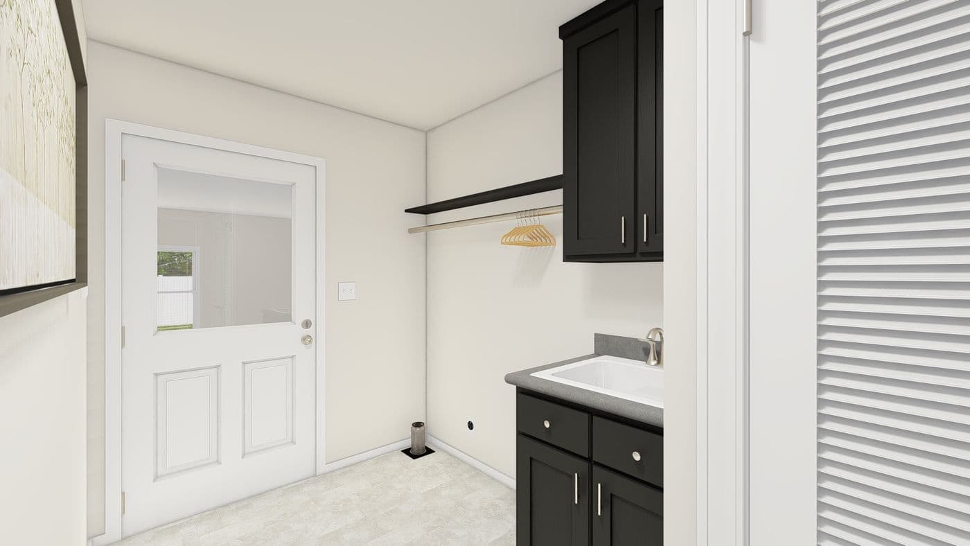 The ING524F WISTERIA GW Utility Room. This Manufactured Mobile Home features 3 bedrooms and 2 baths.