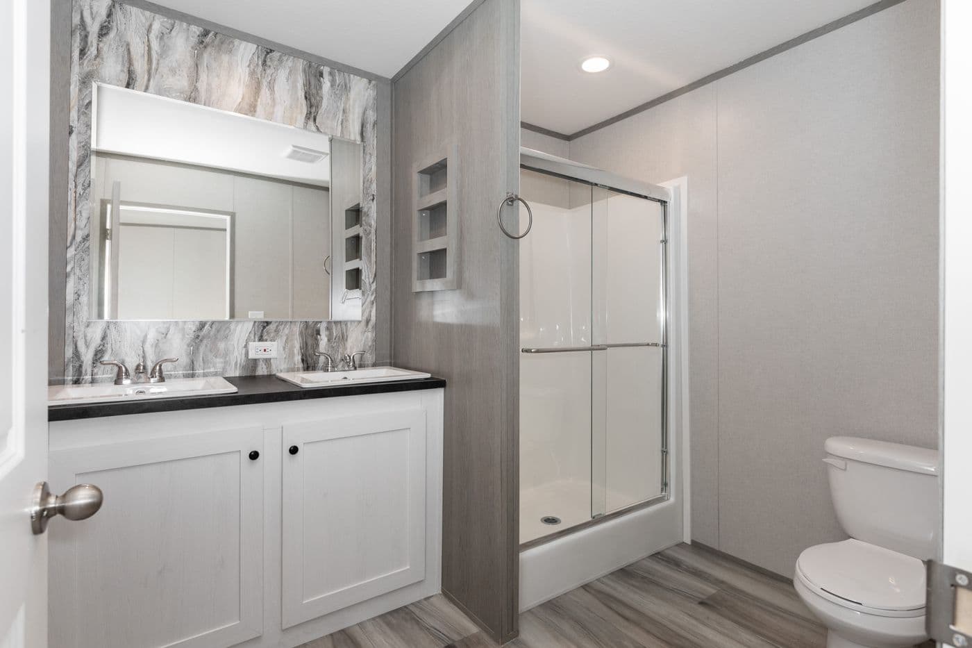The THE PANTRY HOUSE Primary Bathroom. This Manufactured Mobile Home features 3 bedrooms and 2 baths.