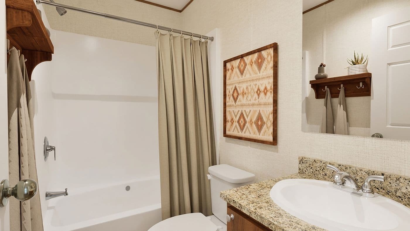 The ASPEN Guest Bathroom. This Manufactured Mobile Home features 3 bedrooms and 2 baths.