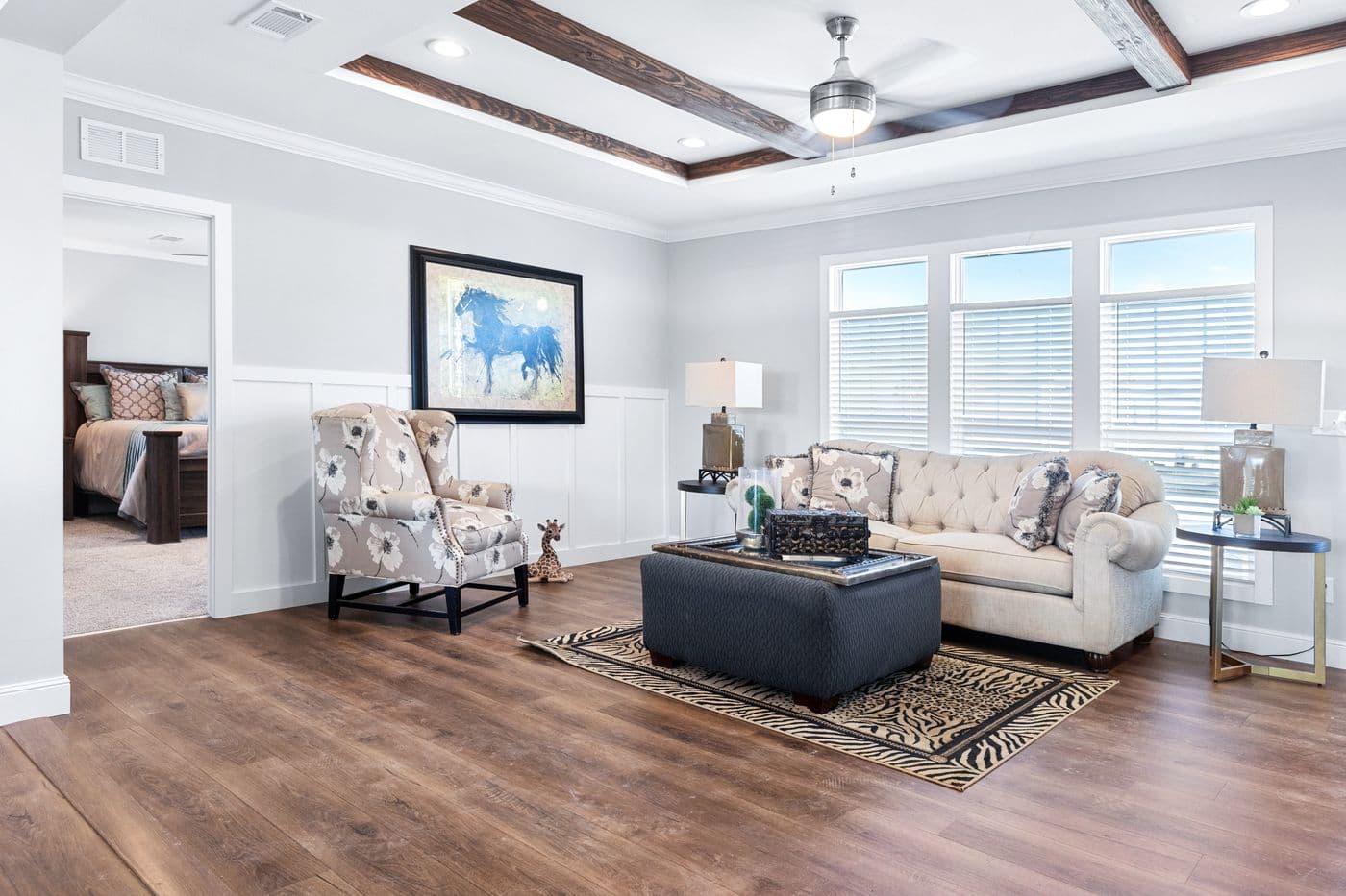 The THE FUJI Living Room. This Manufactured Mobile Home features 4 bedrooms and 3 baths.