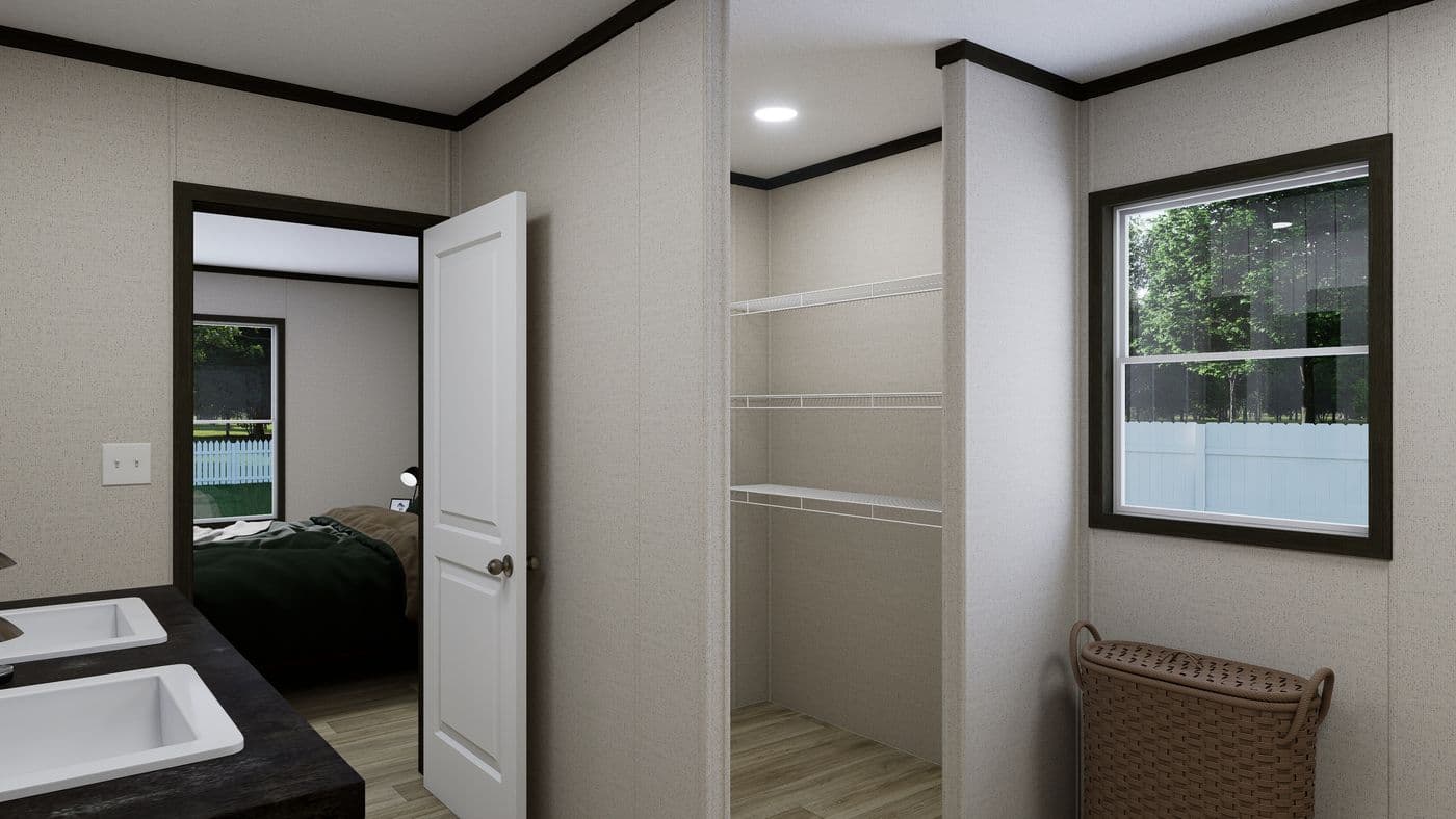 The VENTURE Primary Bathroom. This Manufactured Mobile Home features 4 bedrooms and 2 baths.