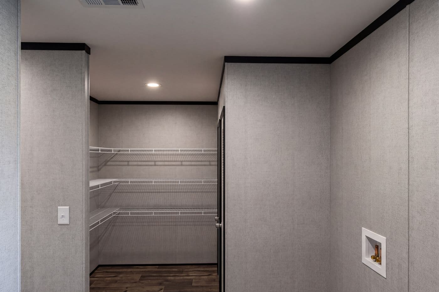 The THE MOUNTAINEER 48 Pantry. This Manufactured Mobile Home features 3 bedrooms and 2 baths.