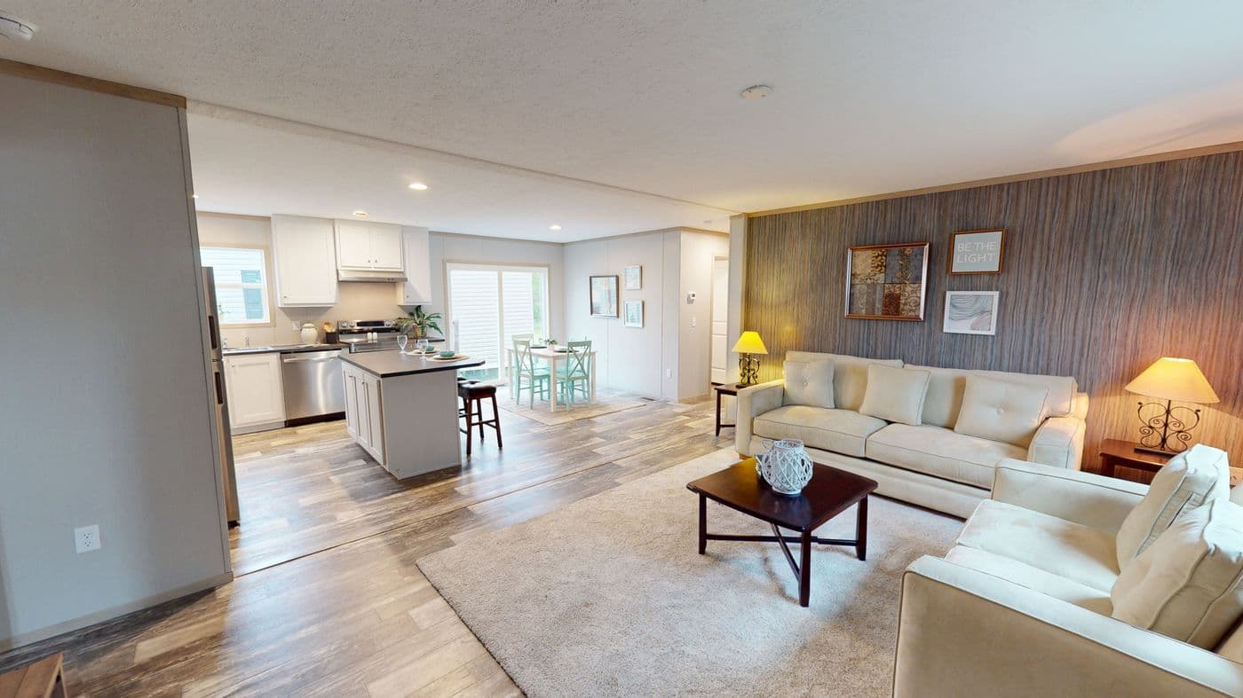 The FRANKLIN Living Room. This Manufactured Mobile Home features 3 bedrooms and 2 baths.