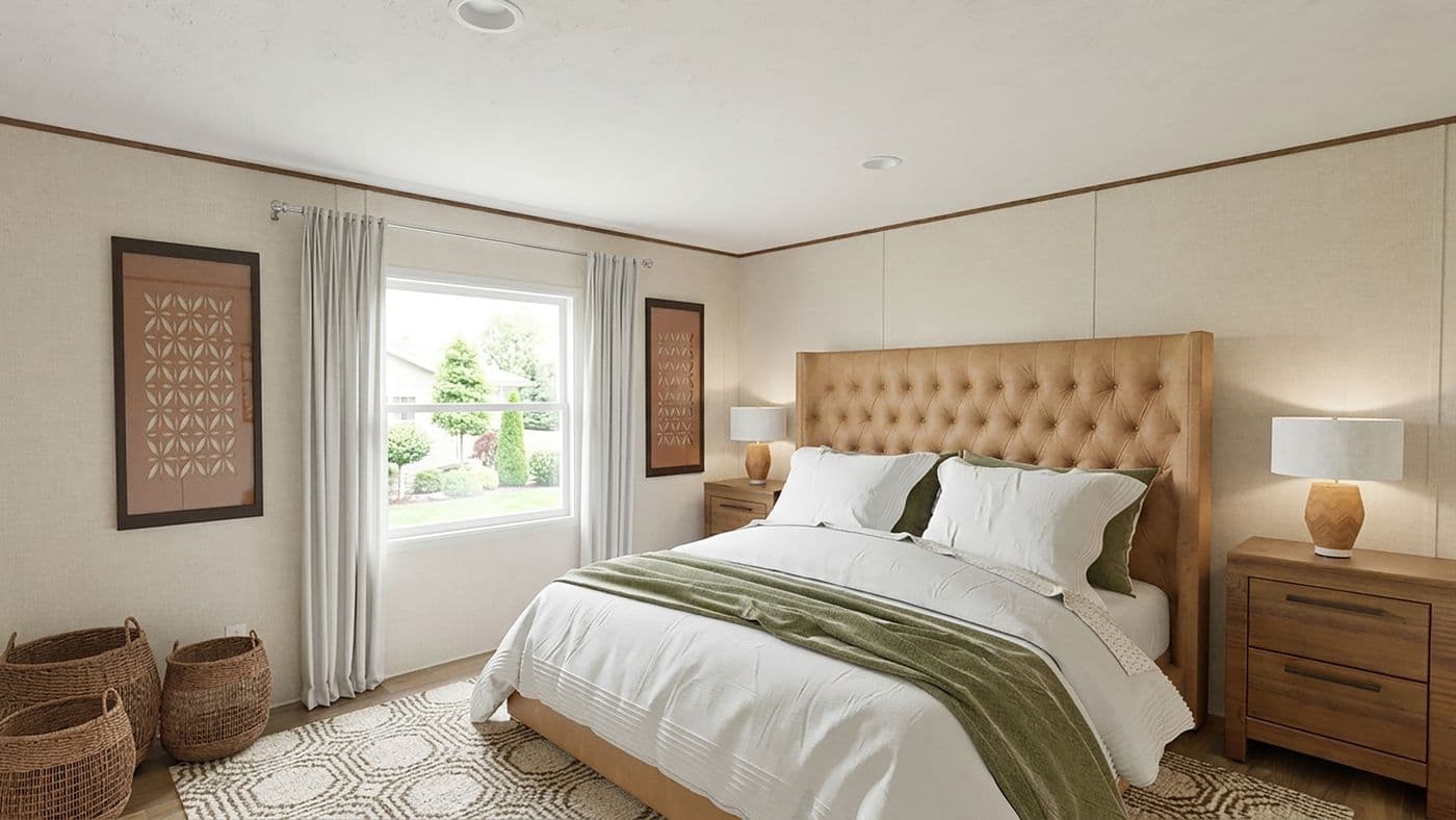 The MAPLE Primary Bedroom. This Manufactured Mobile Home features 3 bedrooms and 2 baths.