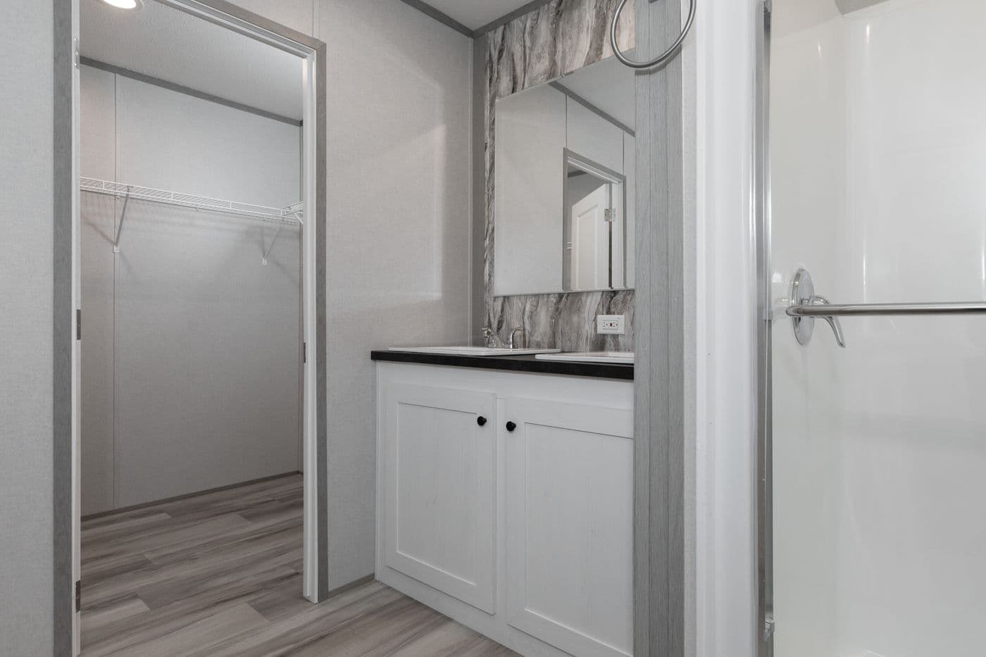 The THE PANTRY HOUSE Primary Bathroom. This Manufactured Mobile Home features 3 bedrooms and 2 baths.