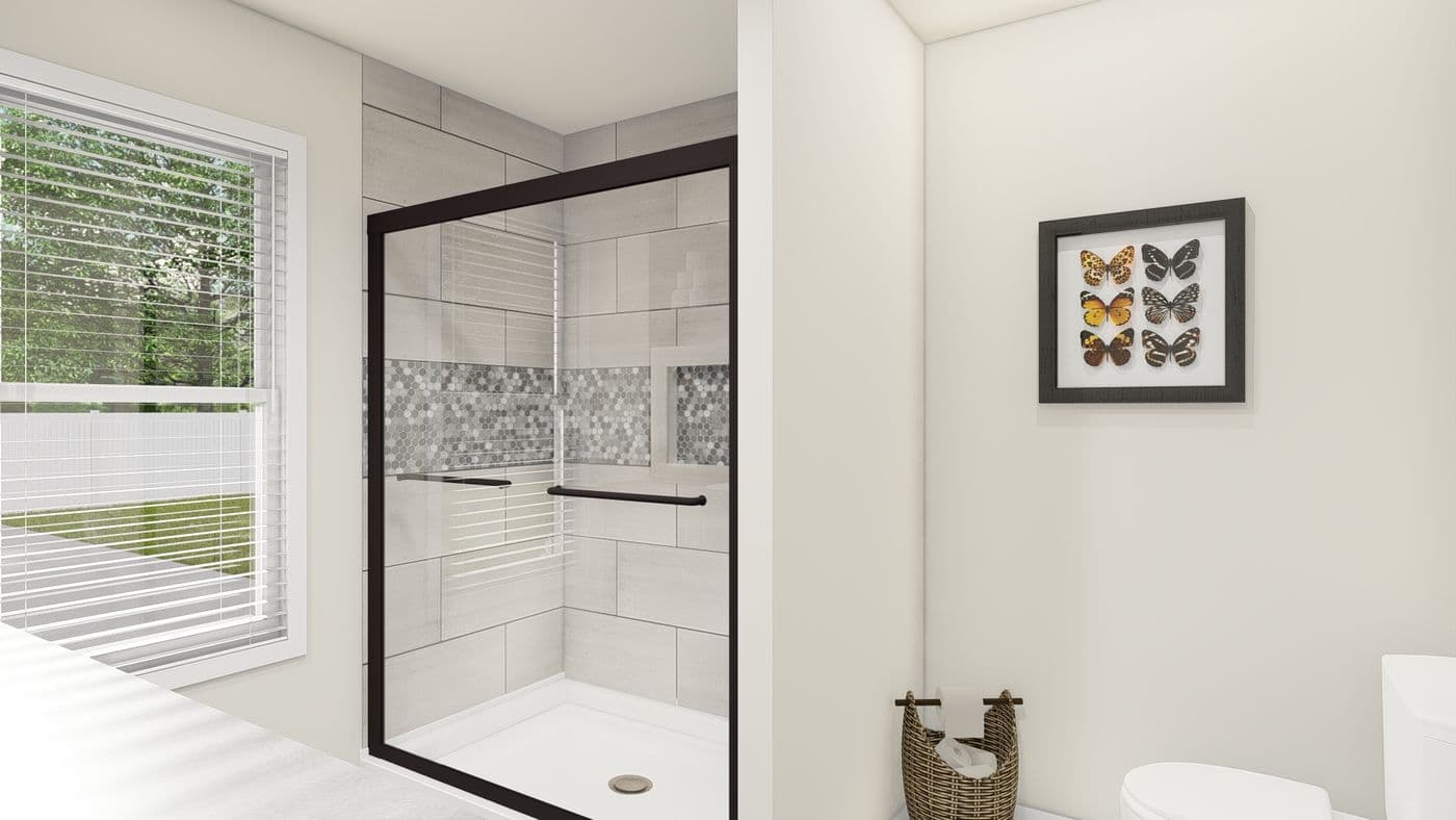 The ING524F WISTERIA GW Primary Bathroom. This Manufactured Mobile Home features 3 bedrooms and 2 baths.