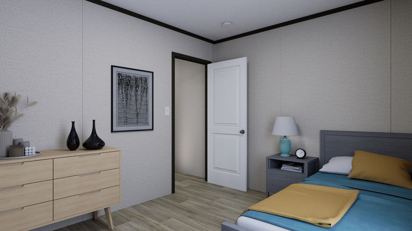 The RALLY Guest Bedroom. This Manufactured Mobile Home features 3 bedrooms and 2 baths.