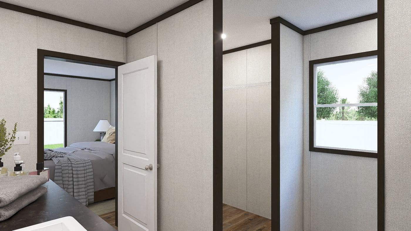 The OCCASION Primary Bathroom. This Manufactured Mobile Home features 4 bedrooms and 2 baths.