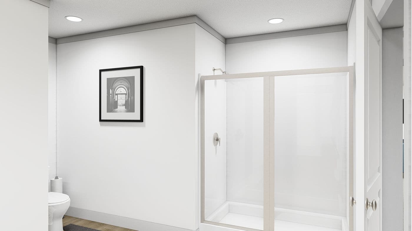 The WONDERFUL WORLD Primary Bathroom. This Manufactured Mobile Home features 3 bedrooms and 2 baths.