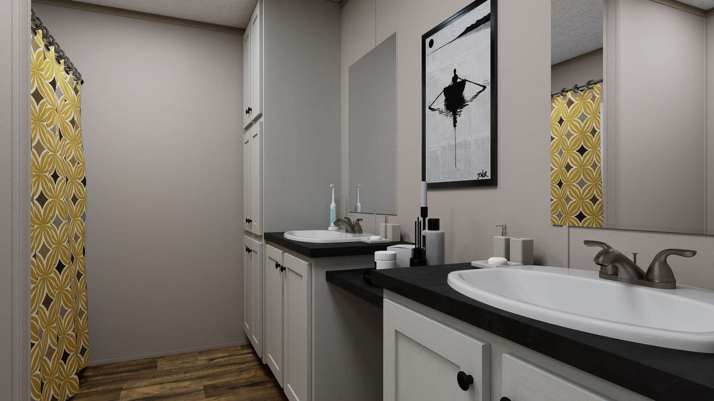 The MOUNTAIN BREEZE 3260 Guest Bathroom. This Manufactured Mobile Home features 3 bedrooms and 2 baths.