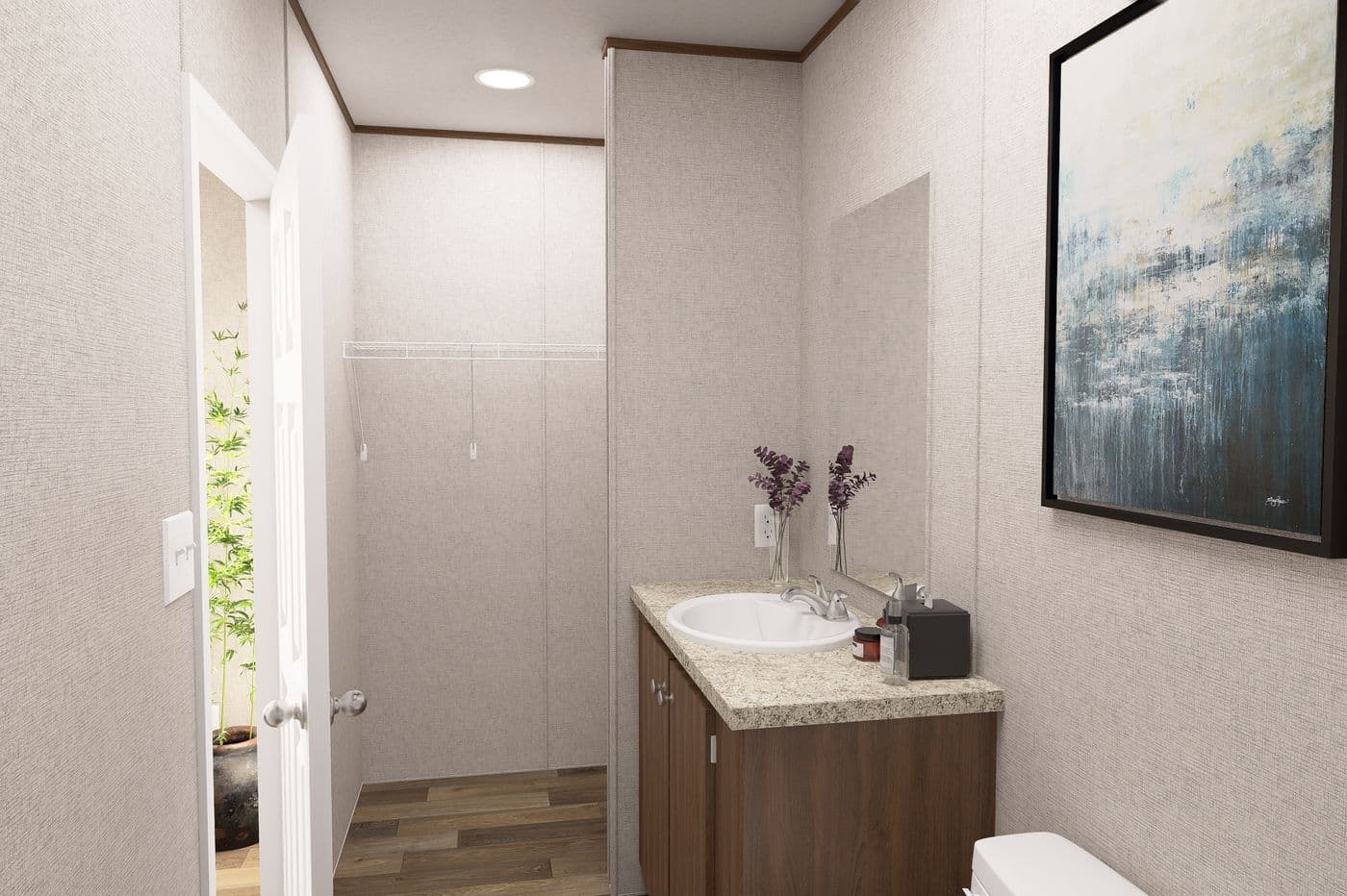 The CYPRESS Primary Bathroom. This Manufactured Mobile Home features 4 bedrooms and 2 baths.