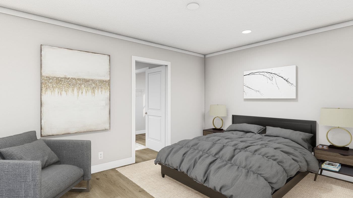 The SWEET CAROLINE Primary Bedroom. This Manufactured Mobile Home features 3 bedrooms and 2 baths.