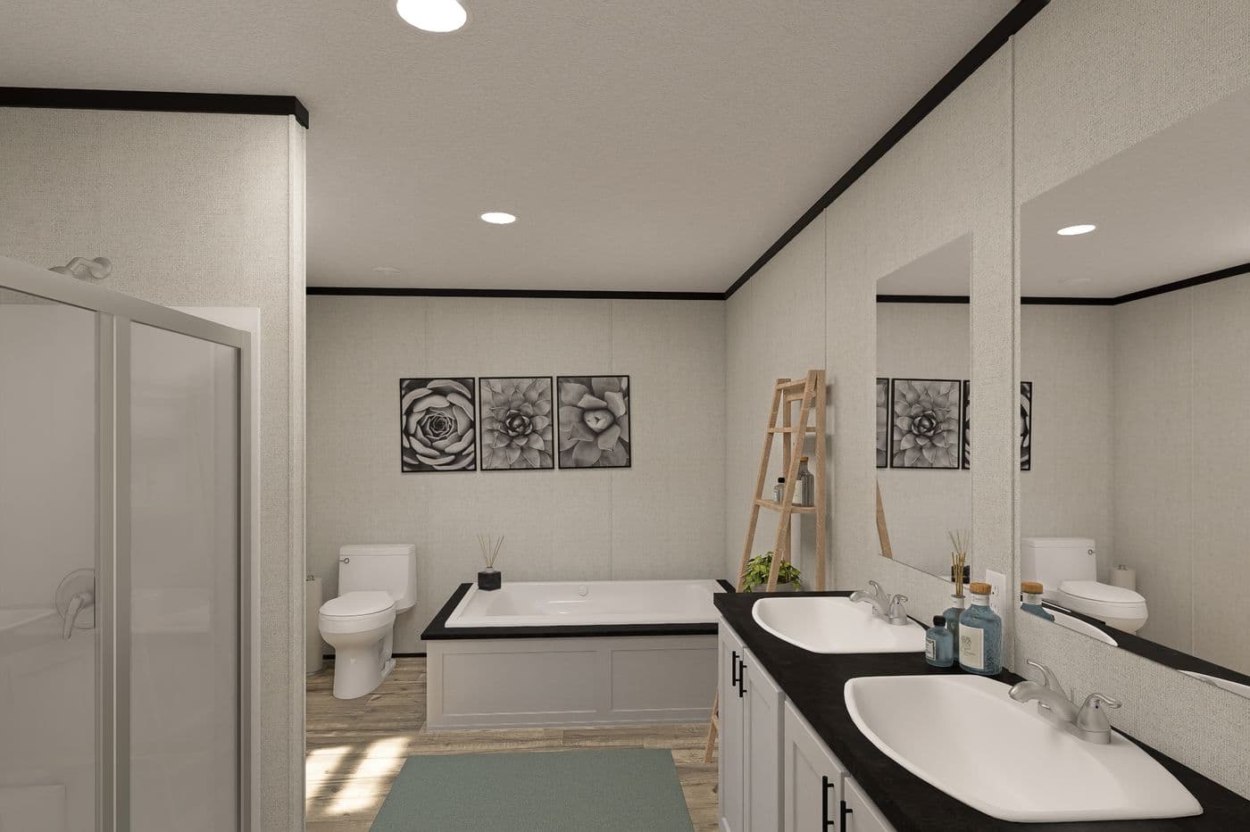 The THE MOUNTAINEER 48 Primary Bathroom. This Manufactured Mobile Home features 3 bedrooms and 2 baths.