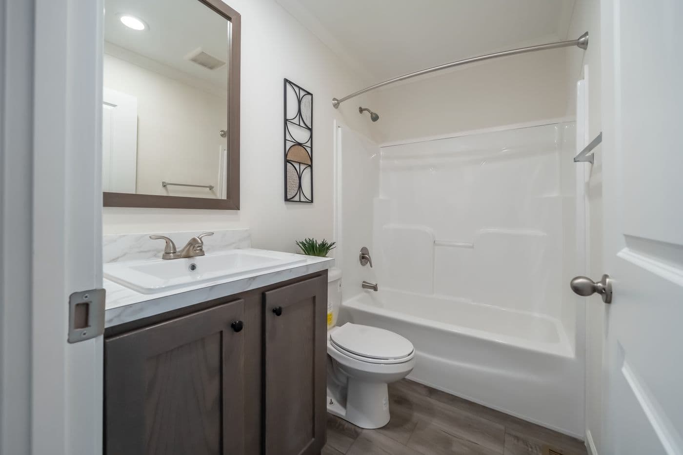 The 4200 "SOUTHPORT" 58'4X16 Guest Bathroom. This Manufactured Mobile Home features 2 bedrooms and 2 baths.