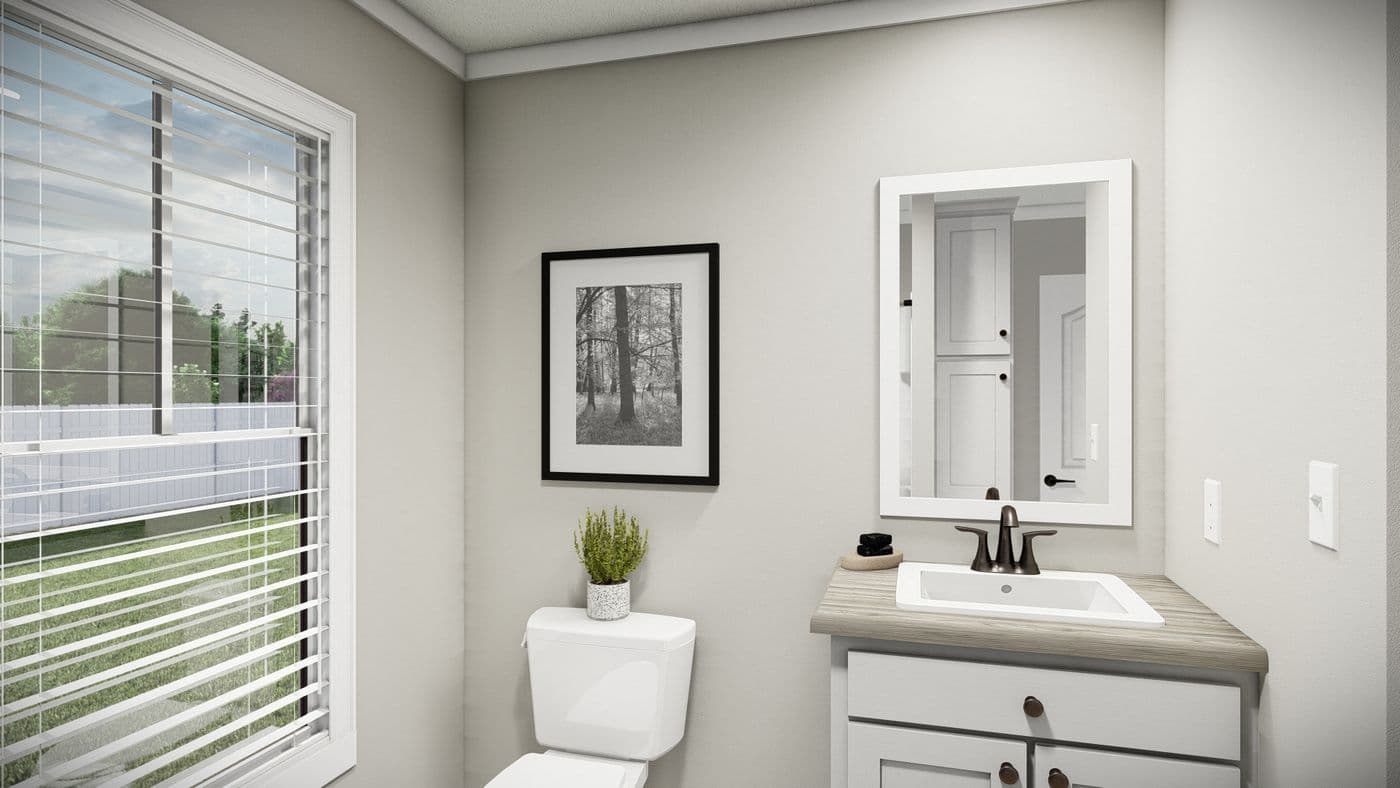 The THE WASHINGTON Guest Bathroom. This Manufactured Mobile Home features 3 bedrooms and 2 baths.