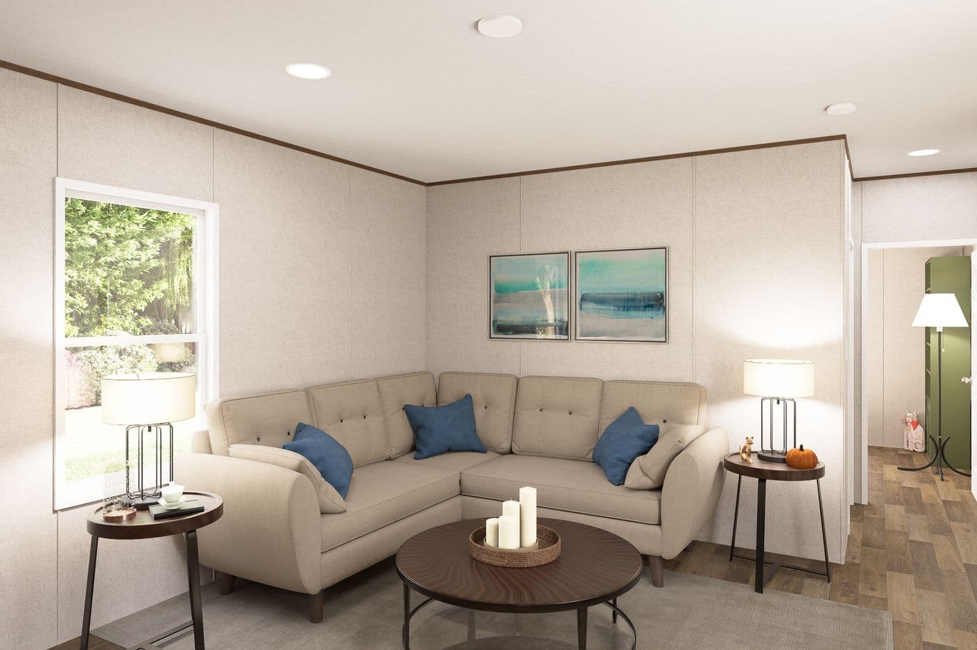 The DOGWOOD Living Room. This Manufactured Mobile Home features 2 bedrooms and 2 baths.