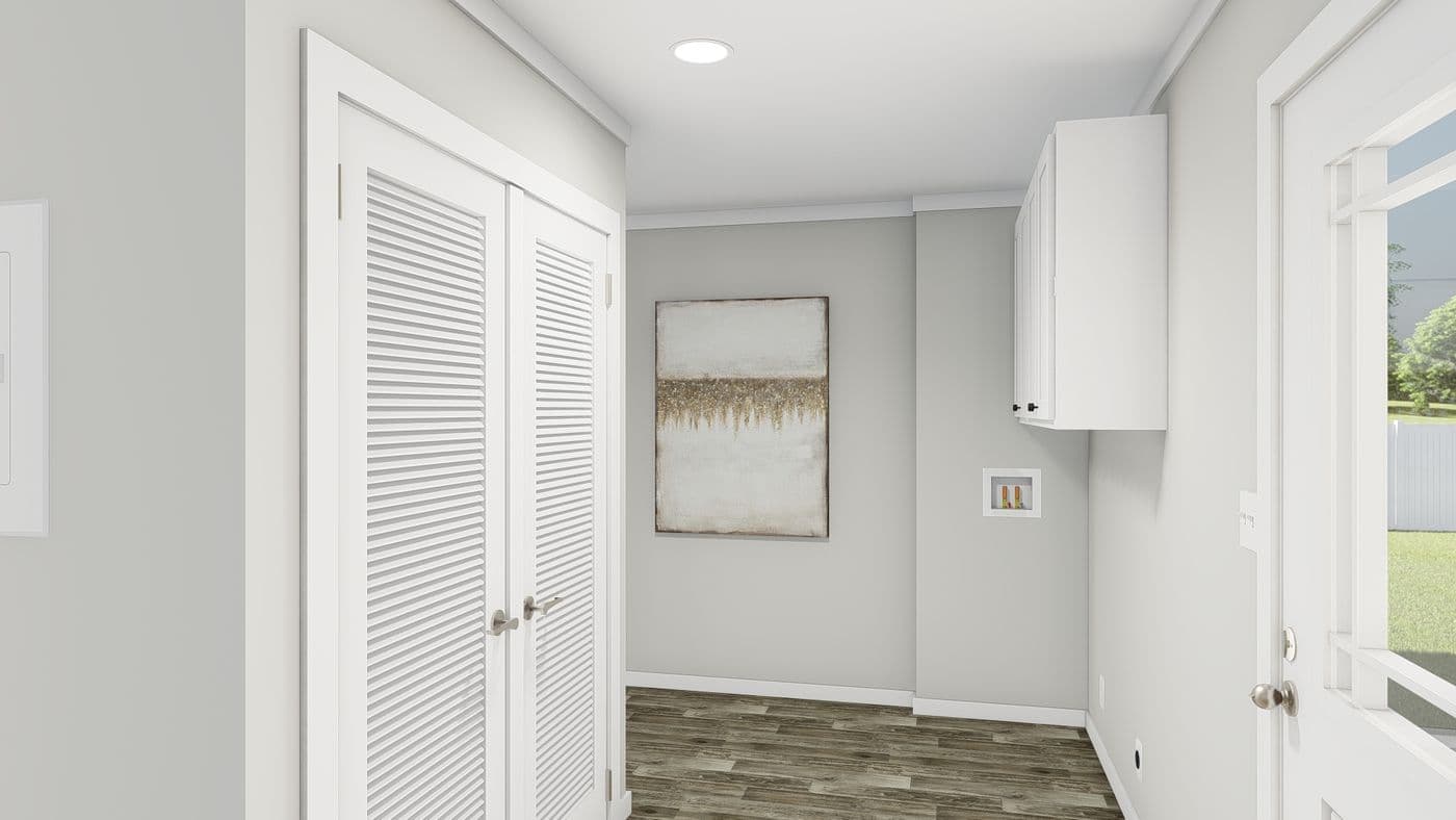 The FRONTIER Utility Room. This Manufactured Mobile Home features 3 bedrooms and 2 baths.