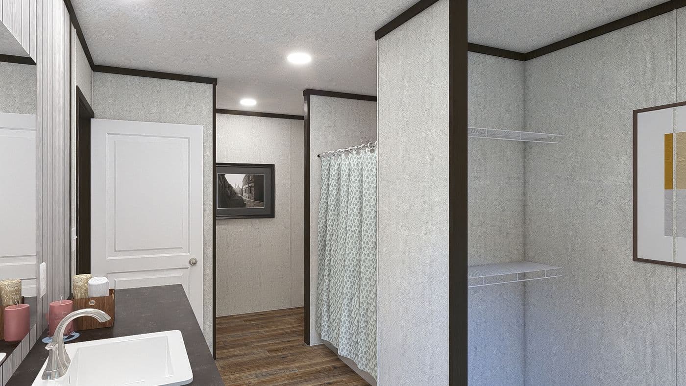 The SENSATION Primary Bathroom. This Manufactured Mobile Home features 3 bedrooms and 2 baths.