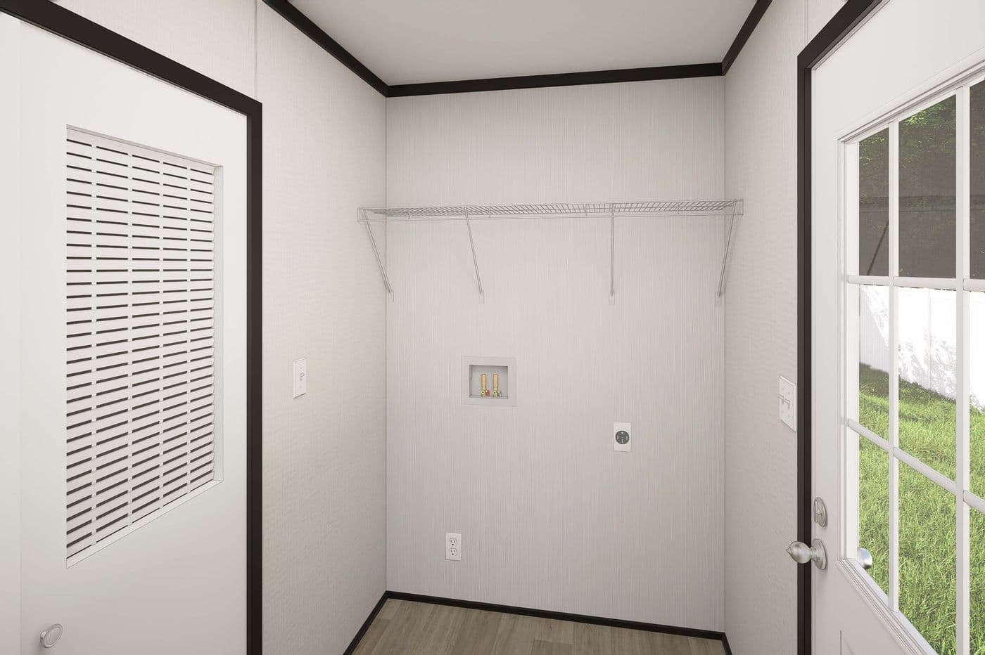The PLATINUM ANNIVERSARY Utility Room. This Manufactured Mobile Home features 3 bedrooms and 2 baths.