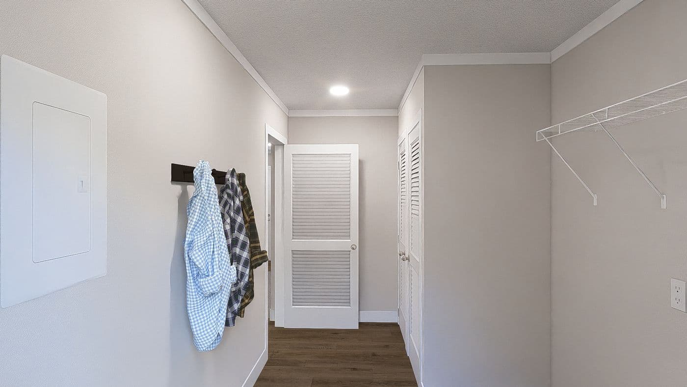 The LEAN ON ME Utility Room. This Manufactured Mobile Home features 3 bedrooms and 2 baths.