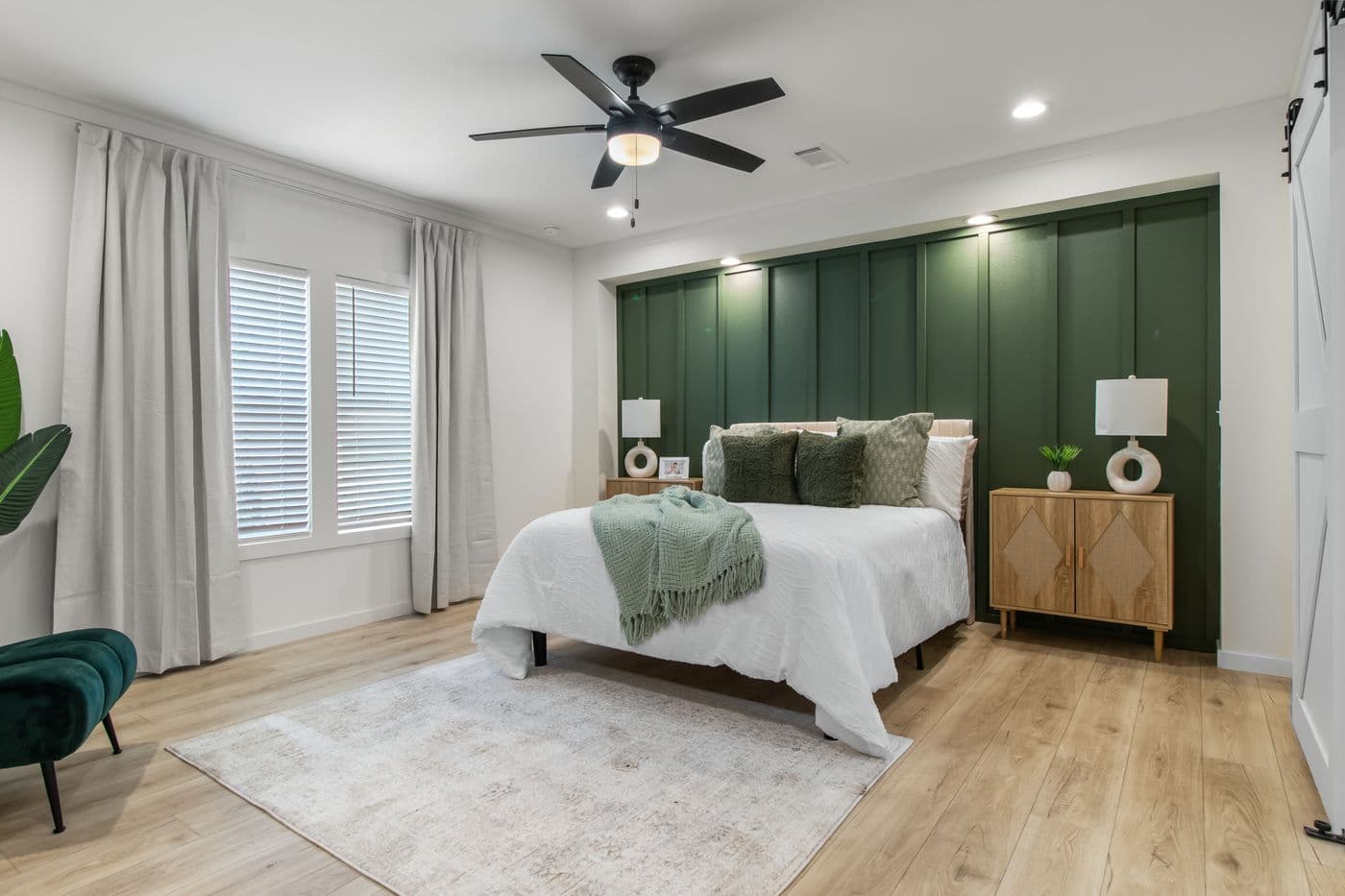 The THE VALENTINO Primary Bedroom. This Manufactured Mobile Home features 4 bedrooms and 2.5 baths.