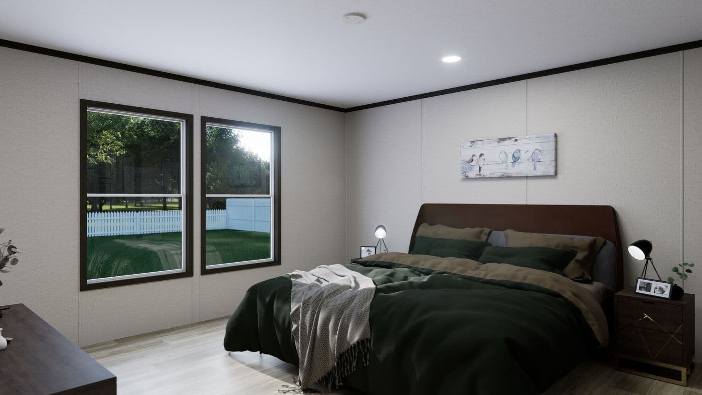 The VENTURE Primary Bedroom. This Manufactured Mobile Home features 4 bedrooms and 2 baths.