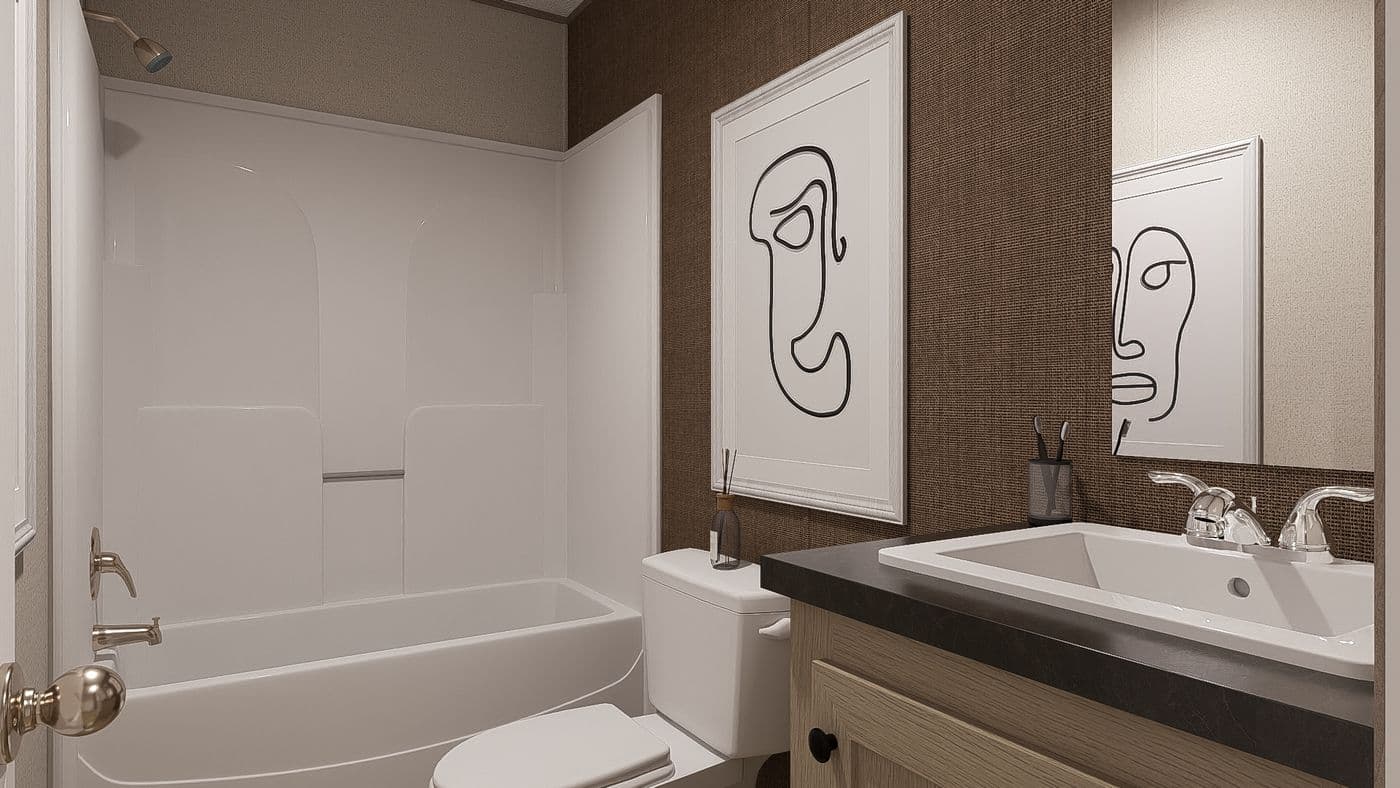 The BLAZER 66 F Guest Bathroom. This Manufactured Mobile Home features 3 bedrooms and 2 baths.