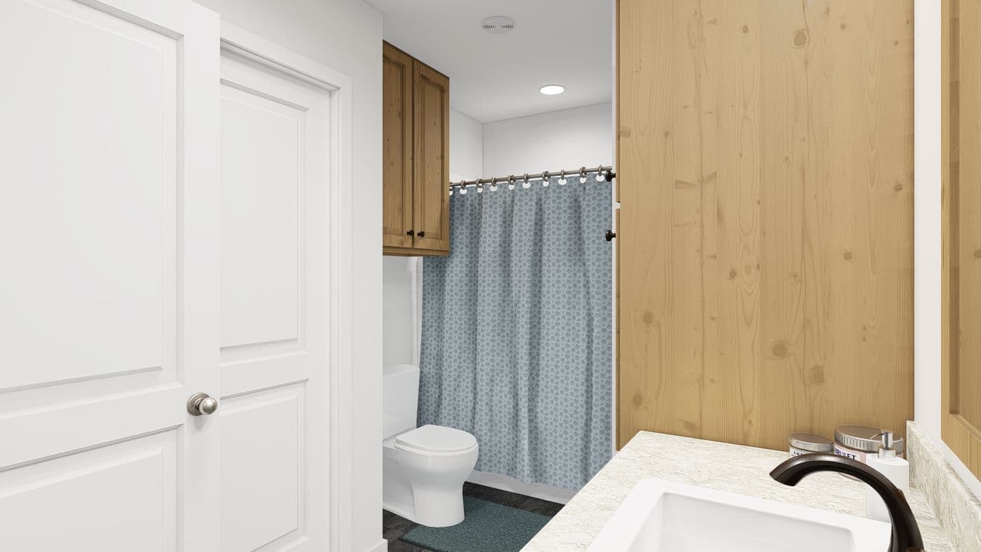 The ING382F REDWOOD II GW Primary Bathroom. This Manufactured Mobile Home features 2 bedrooms and 2 baths.