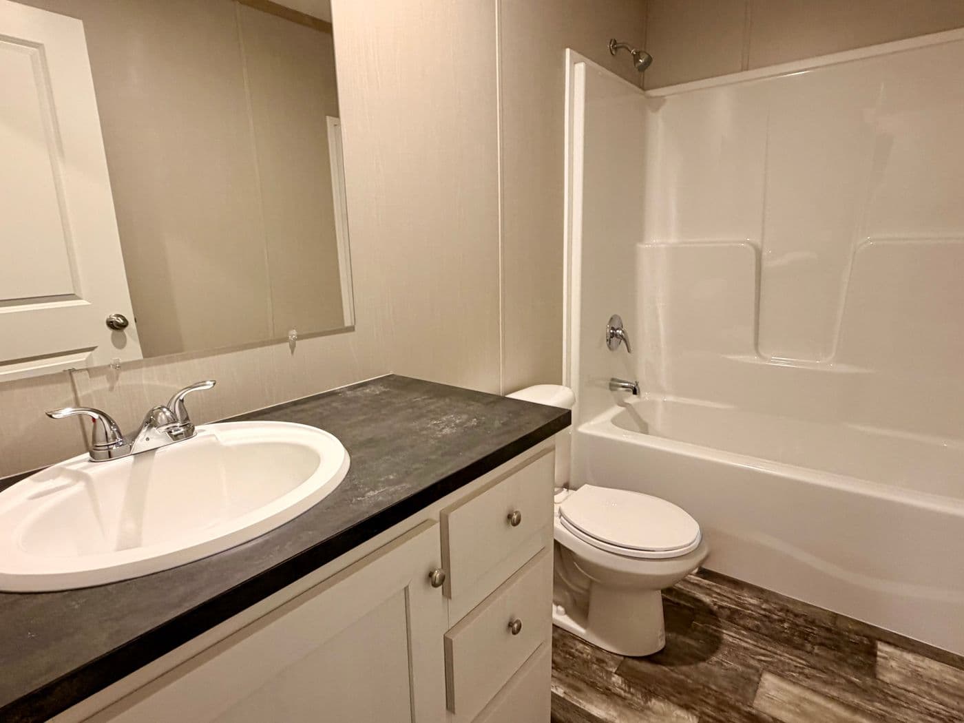The FRANKLIN Guest Bathroom. This Manufactured Mobile Home features 3 bedrooms and 2 baths.