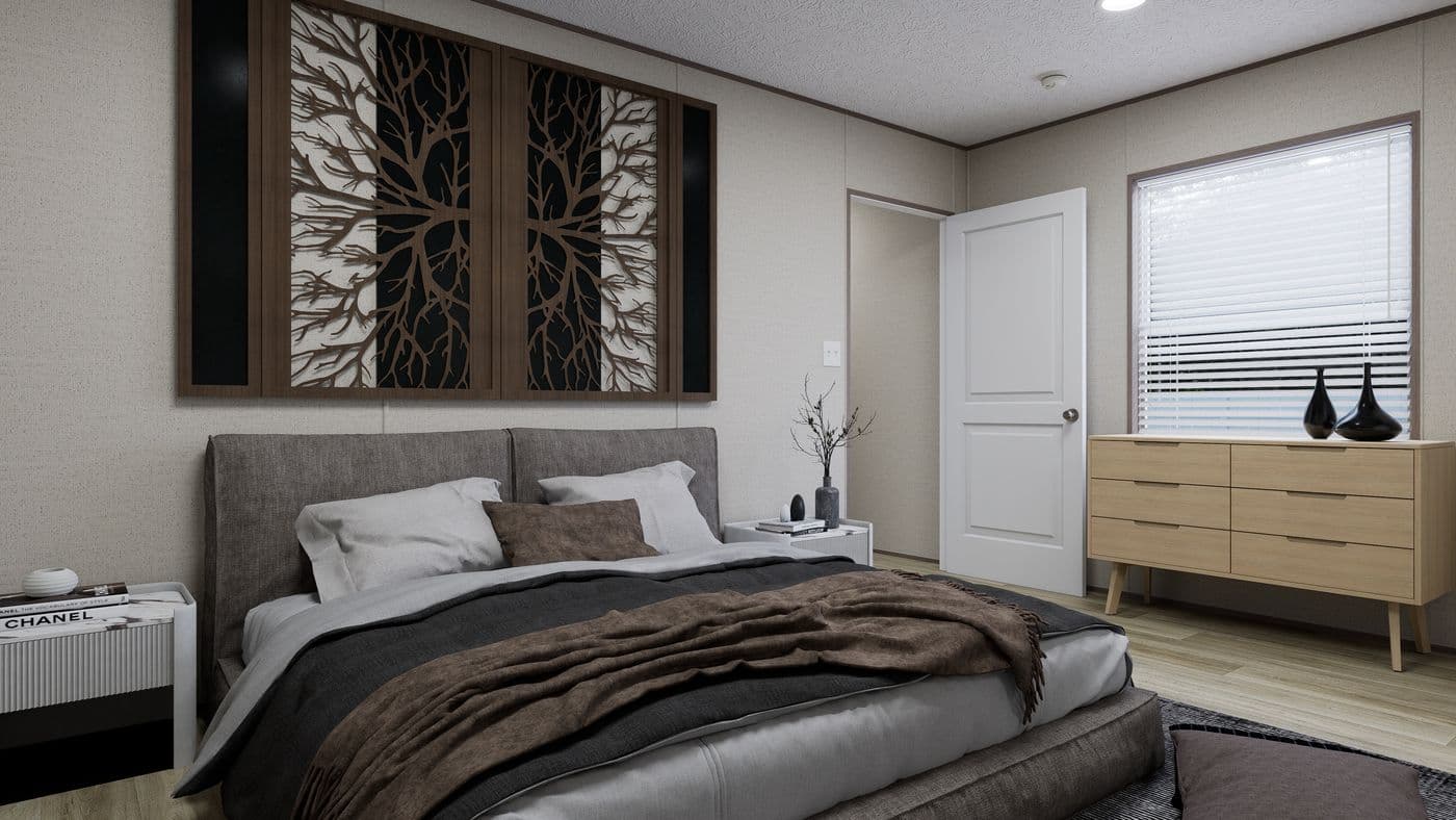 The ROCKY VALLEY Primary Bedroom. This Manufactured Mobile Home features 3 bedrooms and 2 baths.