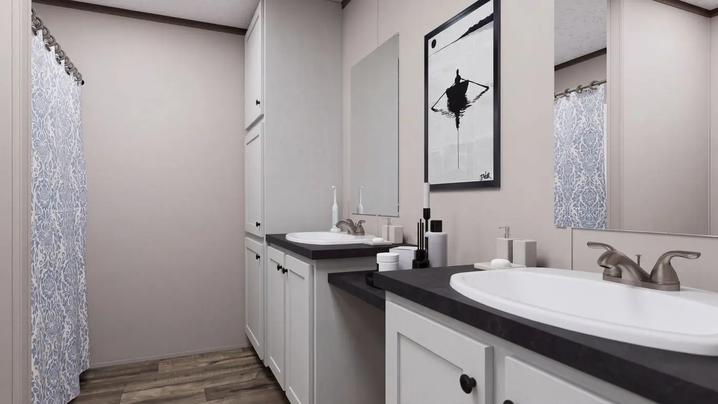 The MOUNTAIN BREEZE 3260 Guest Bathroom. This Manufactured Mobile Home features 3 bedrooms and 2 baths.