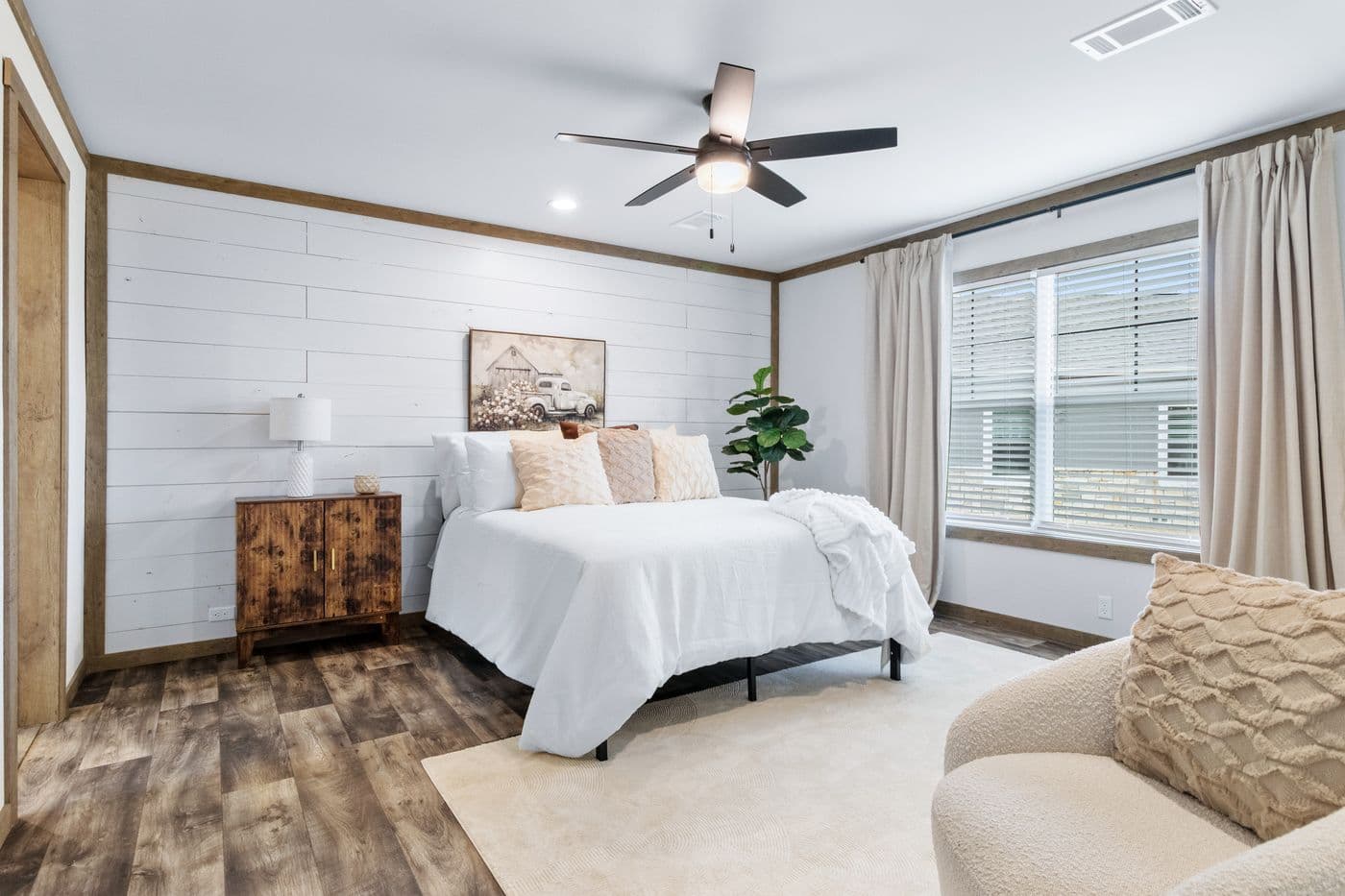 The SAWYER ELITE Primary Bedroom. This Manufactured Mobile Home features 3 bedrooms and 2 baths.
