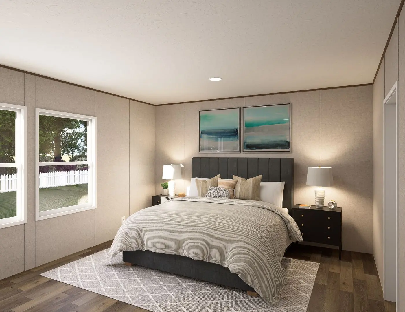 The REDWOOD Primary Bedroom. This Manufactured Mobile Home features 5 bedrooms and 3 baths.