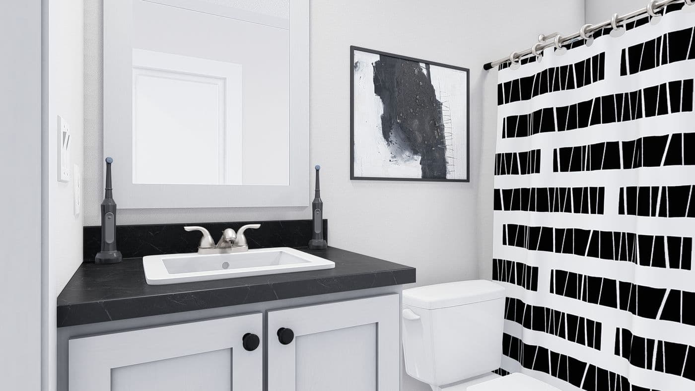 The JOHNNY B GOODE Guest Bathroom. This Manufactured Mobile Home features 3 bedrooms and 2 baths.