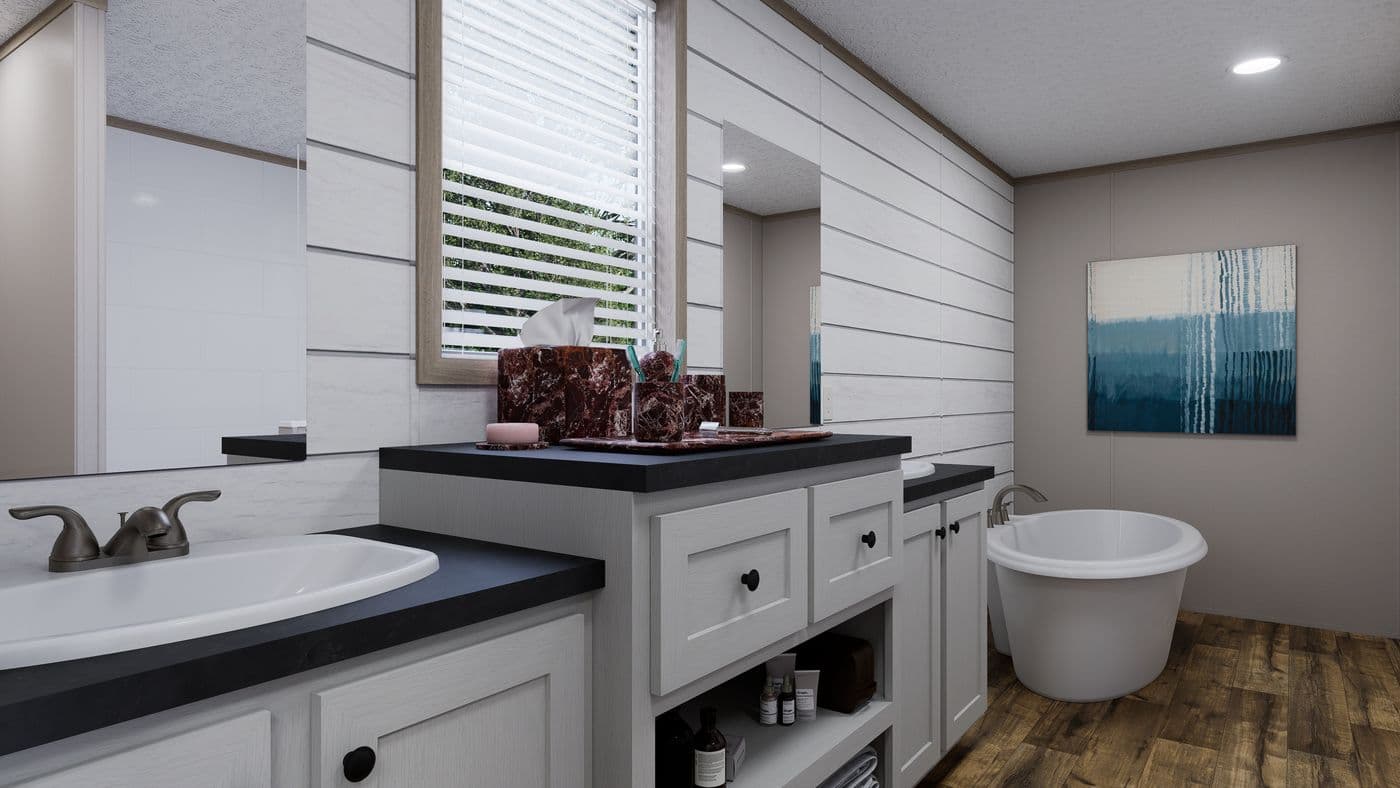 The MOUNTAIN BREEZE 3260 Primary Bathroom. This Manufactured Mobile Home features 3 bedrooms and 2 baths.