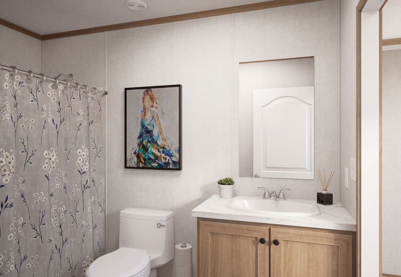 The THE MOUNTAINEER 68 Guest Bathroom. This Manufactured Mobile Home features 4 bedrooms and 2 baths.