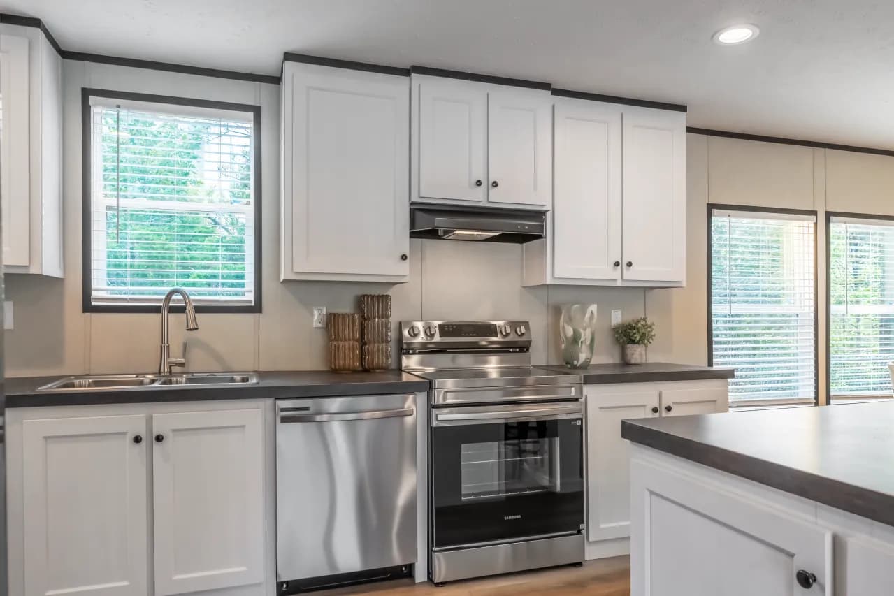 The PLATINUM ANNIVERSARY Exterior. This Manufactured Mobile Home features 3 bedrooms and 2 baths.