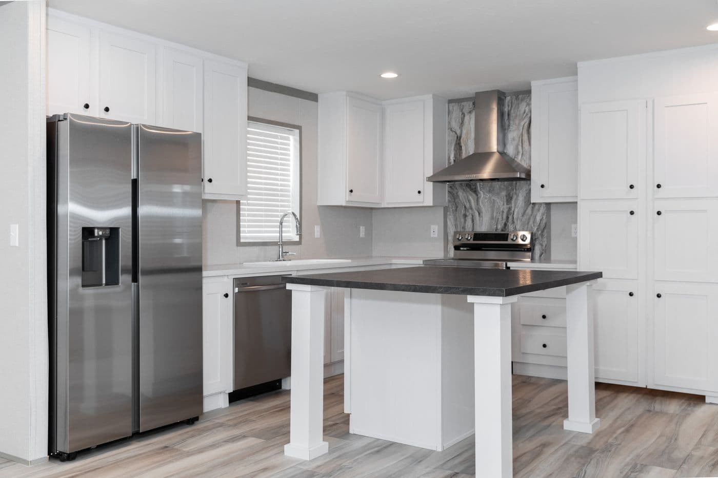 The THE PANTRY HOUSE Kitchen. This Manufactured Mobile Home features 3 bedrooms and 2 baths.