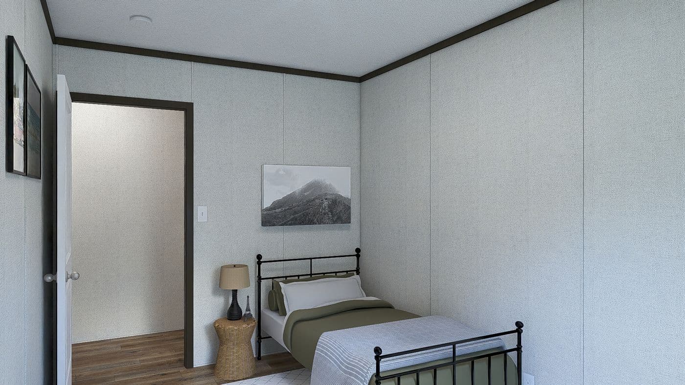 The DESIRE Guest Bedroom. This Manufactured Mobile Home features 3 bedrooms and 2 baths.