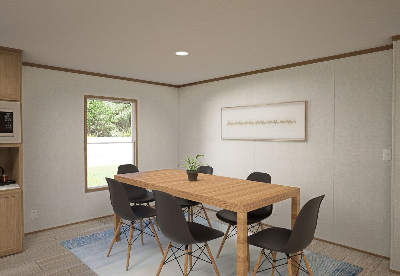 The THE MOUNTAINEER 68 Dining Area. This Manufactured Mobile Home features 4 bedrooms and 2 baths.
